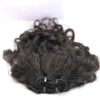 a bundle of black hair extensions in the natural curly texture on a white background