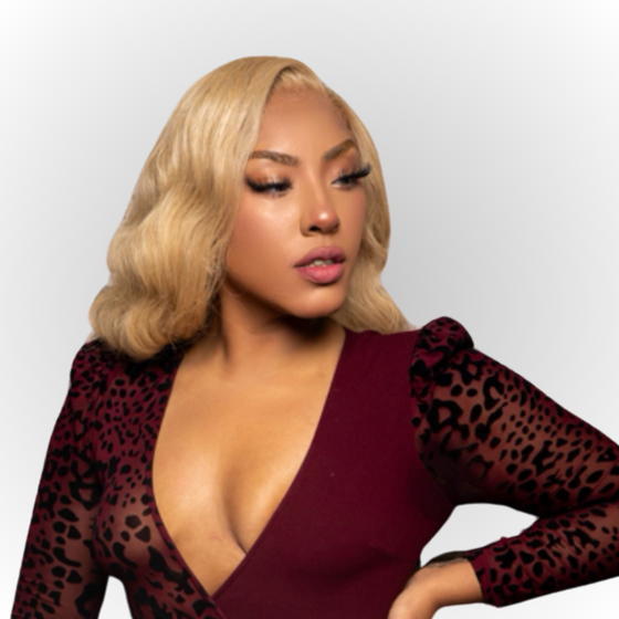 woman with blonde Indian wavy bundles, wearing a red top