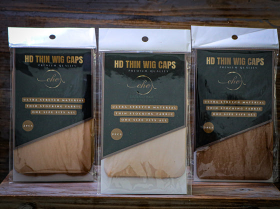 3 packages of thin hd wig caps in the colors transparent, medium brown and dark brown