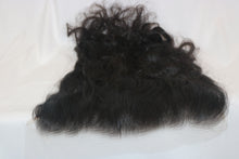  close-up of thin hd lace frontal laid against a white surface